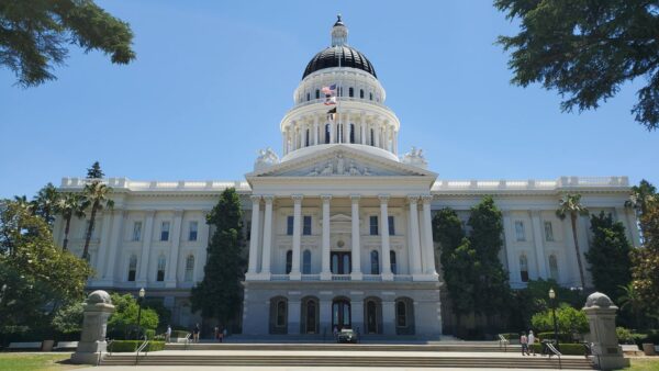 A landscape photo of the outside of the California State capital building.