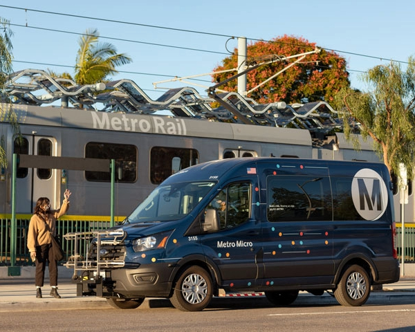 Metro Micro van picking up customer at the metro rail station