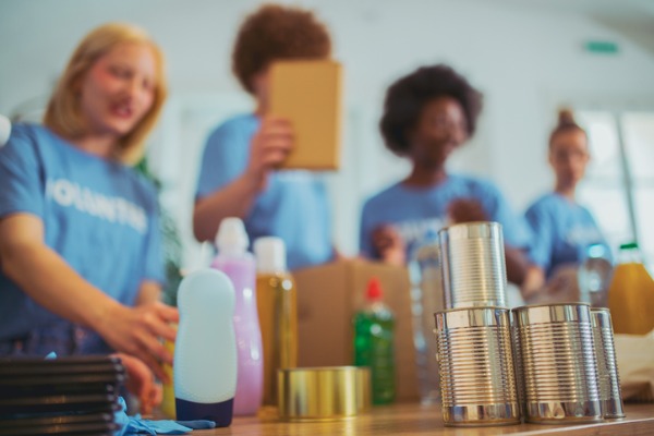 volunteers organizing donations to help their community